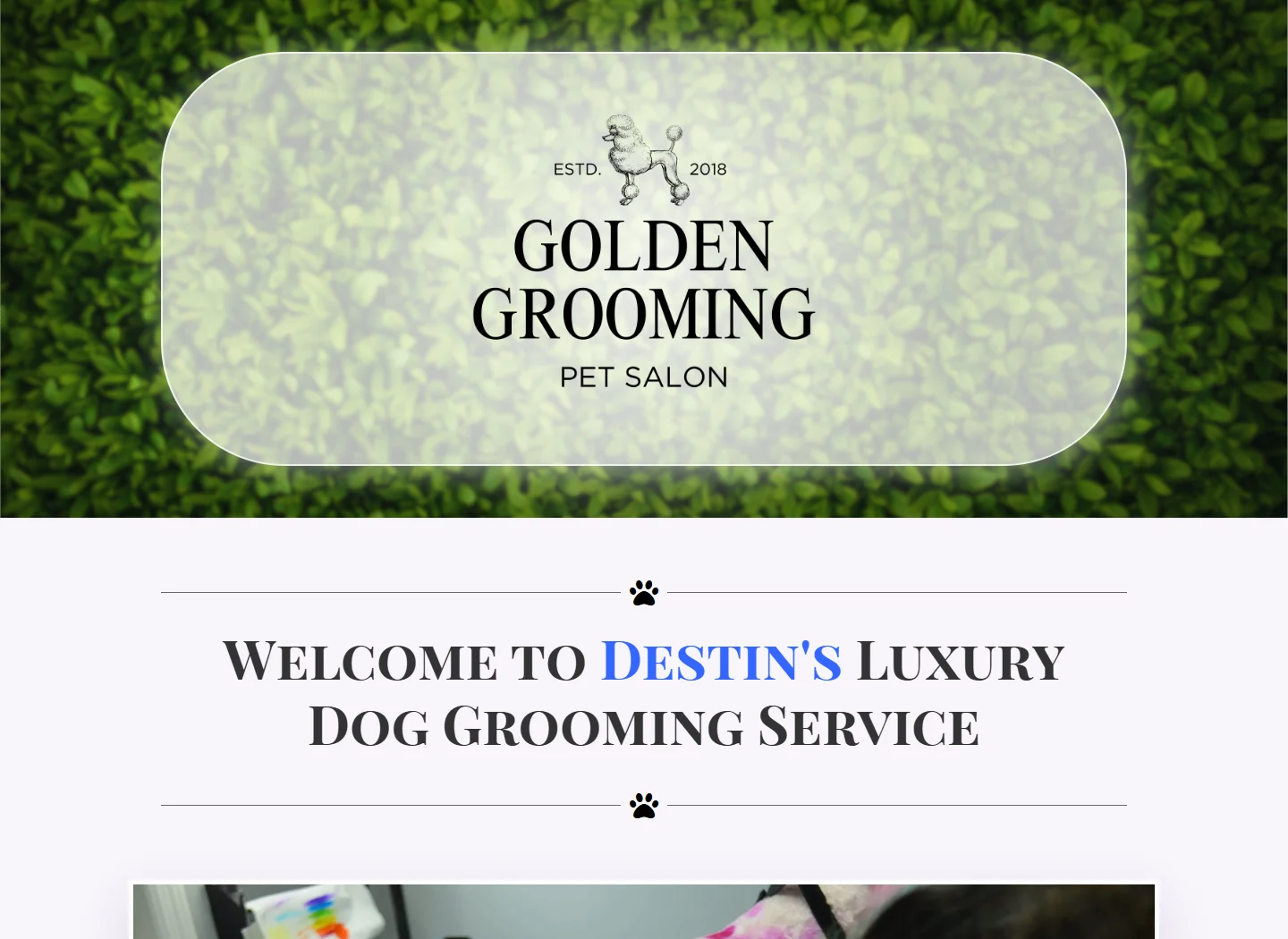 Golden Grooming live homepage with green foliage and salon branding